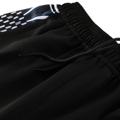 Puma Winterset Jacke + Hose in Schwarz, Weiß und Grau - VENI Fußball